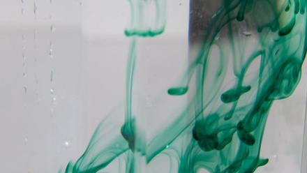 green liquid in water-sustainable lab.jpeg