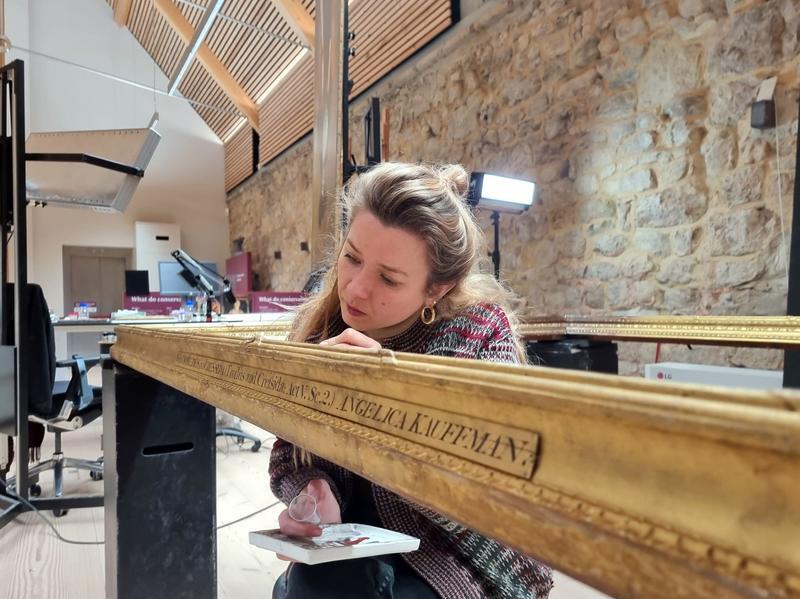 Conservator Jonida Mecani working on the Diomedes and Cressida frame - National Trust Michael Cole.jpg